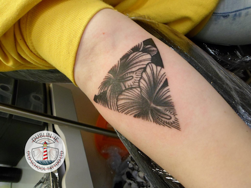geometrical flower tattoo